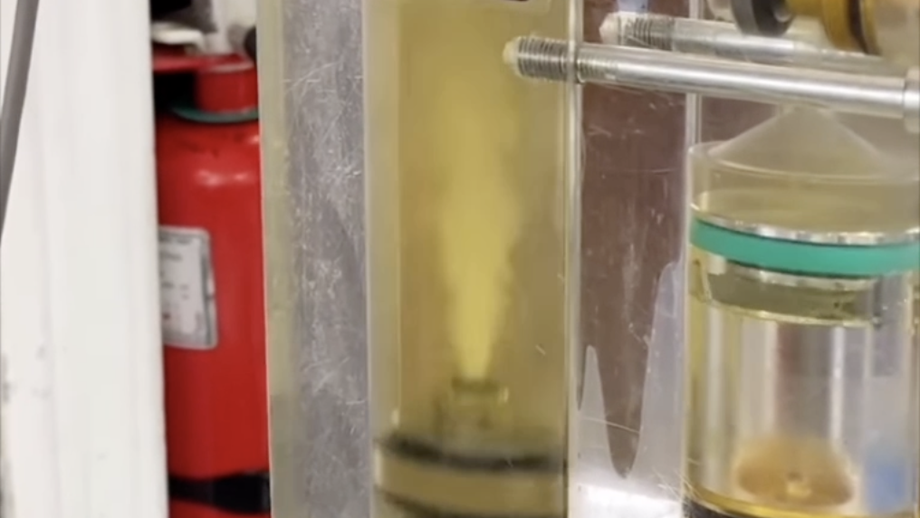 A shock absorber showing cavitation in the fluid